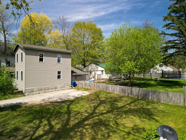 view of yard featuring a trampoline