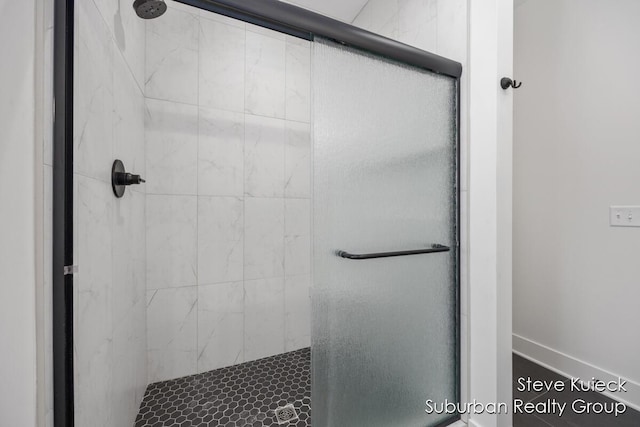 full bathroom featuring a stall shower