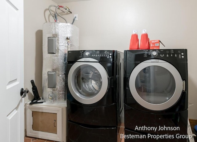 washroom featuring washer and dryer