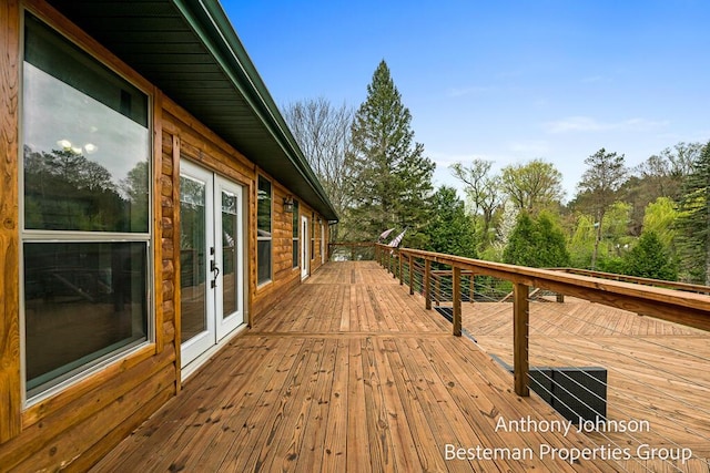wooden terrace featuring french doors
