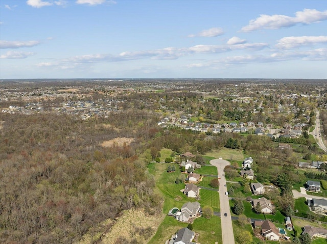 aerial overview of property's location with nearby suburban area