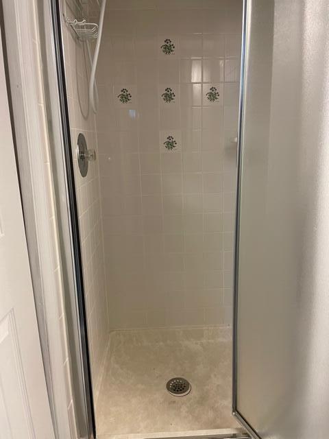 bathroom with a stall shower