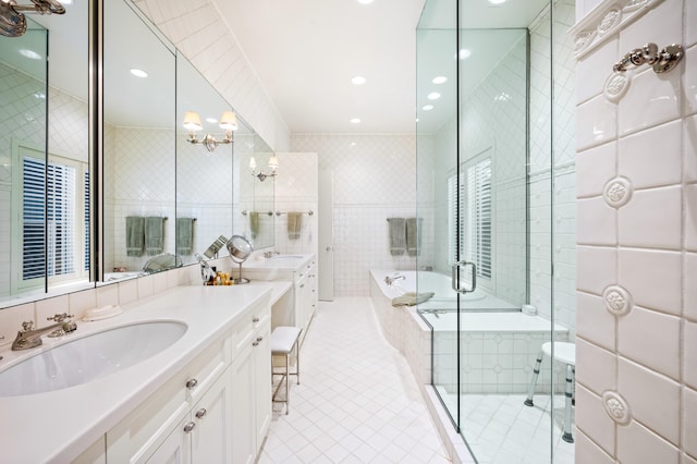 50102 Alpine Blvd, New Buffalo, MI 49117 - bathroom with tile walls, tile patterned flooring, vanity, a garden tub, and a shower stall