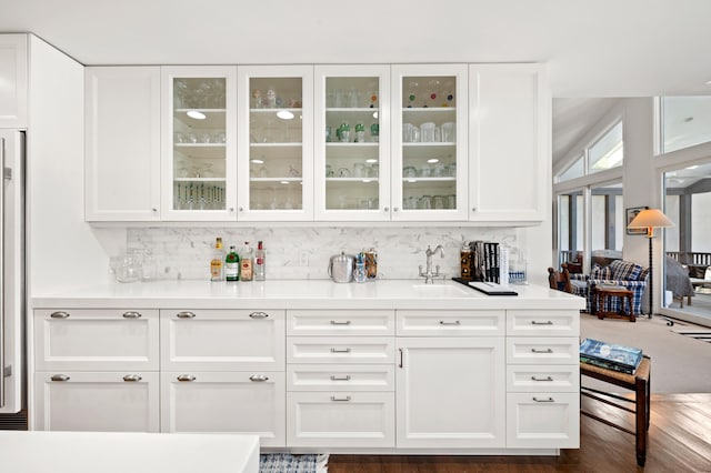 50102 Alpine Blvd, New Buffalo, MI 49117 - indoor bar with backsplash and dark wood-type flooring