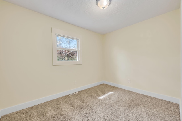1603 E Detroit St, New Buffalo, MI 49117 - empty room featuring baseboards and carpet flooring
