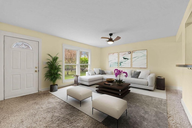 1603 E Detroit St, New Buffalo, MI 49117 - carpeted living area featuring ceiling fan and baseboards