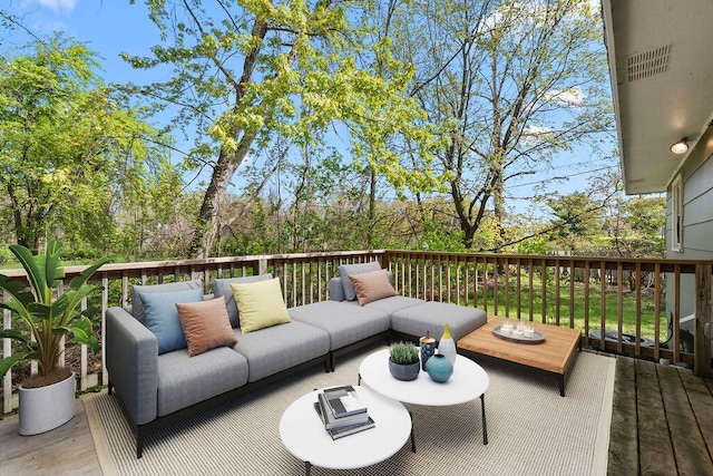 1603 E Detroit St, New Buffalo, MI 49117 - wooden terrace featuring an outdoor living space