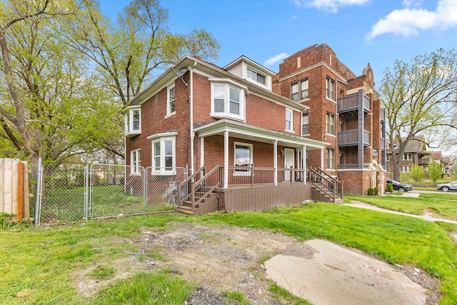 1881 W Grand Blvd, Detroit, MI 48208 - view of front of house featuring brick siding and covered porch