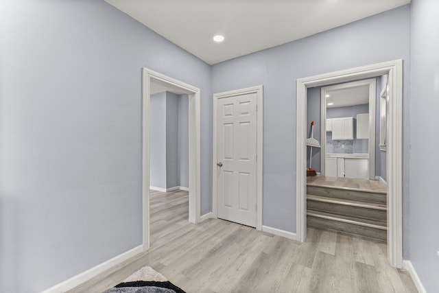 1881 W Grand Blvd, Detroit, MI 48208 - hallway with wood finished floors, baseboards, and recessed lighting