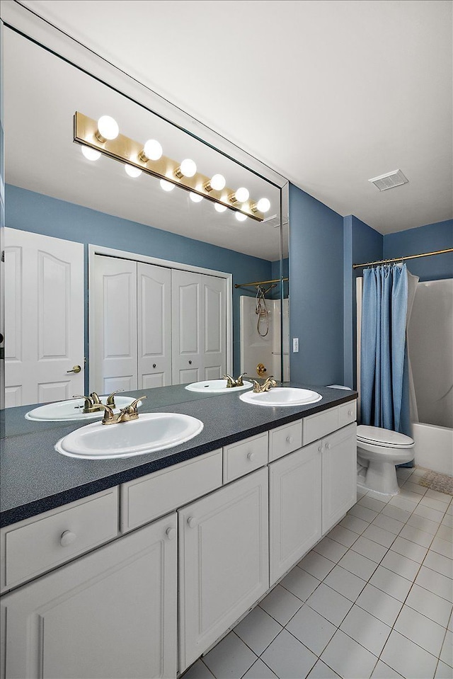 1708 Tremont Rd, Canton, MI 48188 - full bath featuring tile patterned floors, double vanity, and toilet