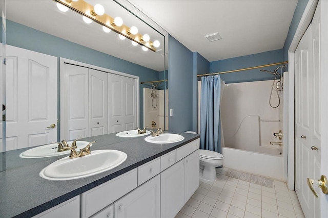 1708 Tremont Rd, Canton, MI 48188 - bathroom featuring tile patterned floors, shower / bath combo, double vanity, and toilet