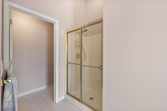 1708 Tremont Rd, Canton, MI 48188 - full bath featuring a stall shower, tile patterned flooring, and baseboards