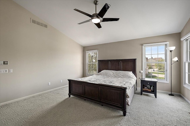 1708 Tremont Rd, Canton, MI 48188 - bedroom with light carpet, lofted ceiling, baseboards, and multiple windows