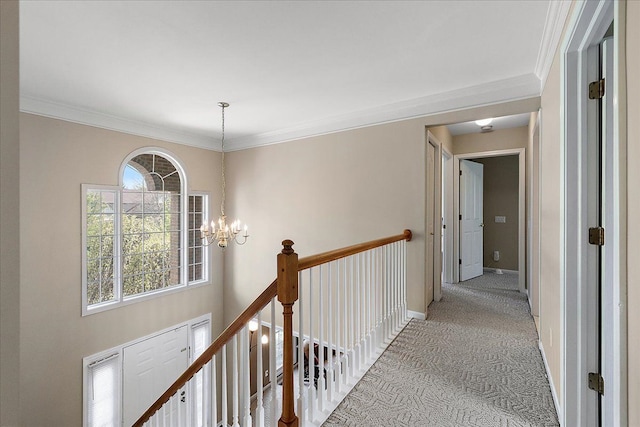 1708 Tremont Rd, Canton, MI 48188 - hallway featuring an upstairs landing, light colored carpet, a chandelier, crown molding, and baseboards
