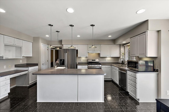 1708 Tremont Rd, Canton, MI 48188 - kitchen featuring appliances with stainless steel finishes, granite floors, dark countertops, under cabinet range hood, and recessed lighting