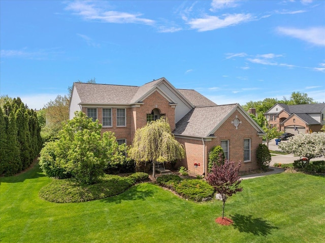 1708 Tremont Rd, Canton, MI 48188 - traditional-style house with brick siding and a front yard