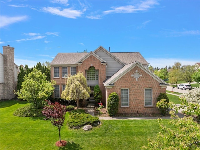 1708 Tremont Rd, Canton, MI 48188 - view of front of house featuring brick siding and a front lawn