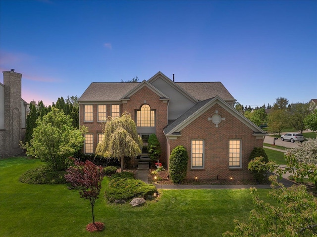 1708 Tremont Rd, Canton, MI 48188 - view of front of home featuring brick siding and a front lawn