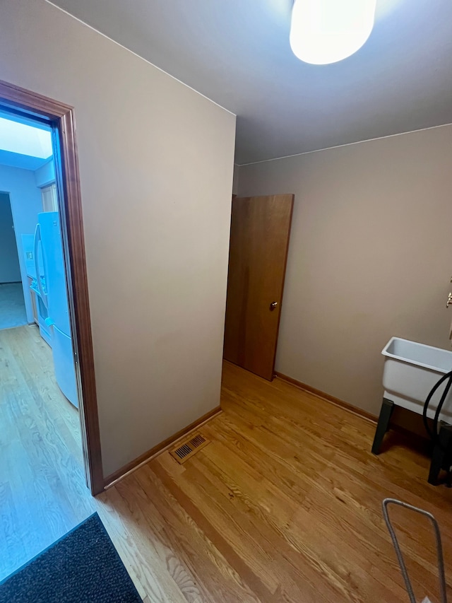 49421 Northwood, Shelby Twp, MI 48315 - hall featuring light wood-style floors and baseboards
