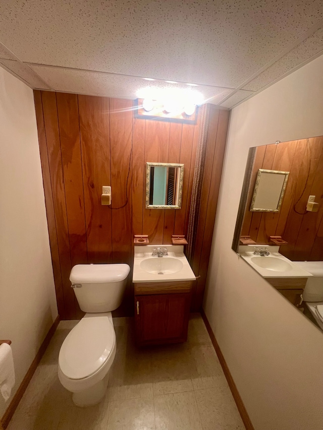 49421 Northwood, Shelby Twp, MI 48315 - bathroom with toilet, baseboards, tile patterned floors, and vanity