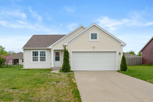 4143 Wild Meadow St, Kalamazoo, MI 49048 - traditional-style home with driveway, a garage, and a shingled roof