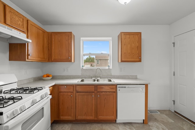 4143 Wild Meadow St, Kalamazoo, MI 49048 - kitchen featuring white appliances, a sink, under cabinet range hood, and light countertops