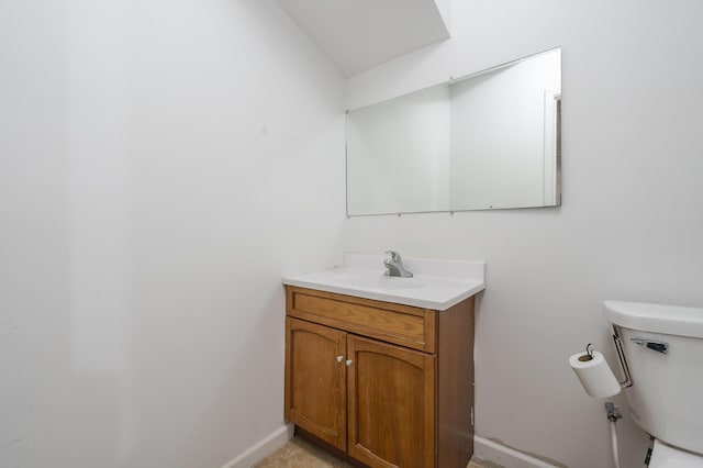 4143 Wild Meadow St, Kalamazoo, MI 49048 - half bathroom with toilet, vanity, and baseboards