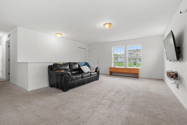 4143 Wild Meadow St, Kalamazoo, MI 49048 - carpeted living room featuring baseboards