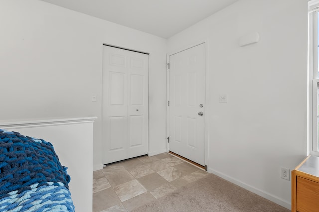 4143 Wild Meadow St, Kalamazoo, MI 49048 - unfurnished bedroom with baseboards and a closet
