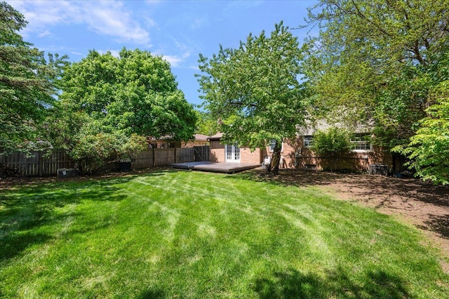 15672 Robert Dr, Macomb, MI 48044 - view of yard featuring a wooden deck