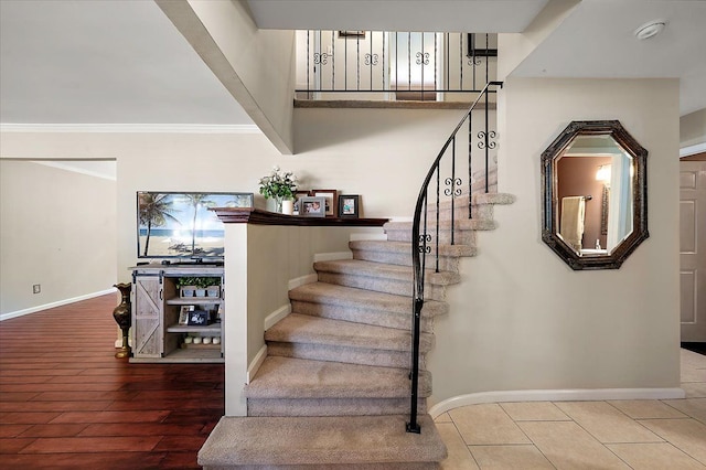 15672 Robert Dr, Macomb, MI 48044 - staircase with baseboards and ornamental molding