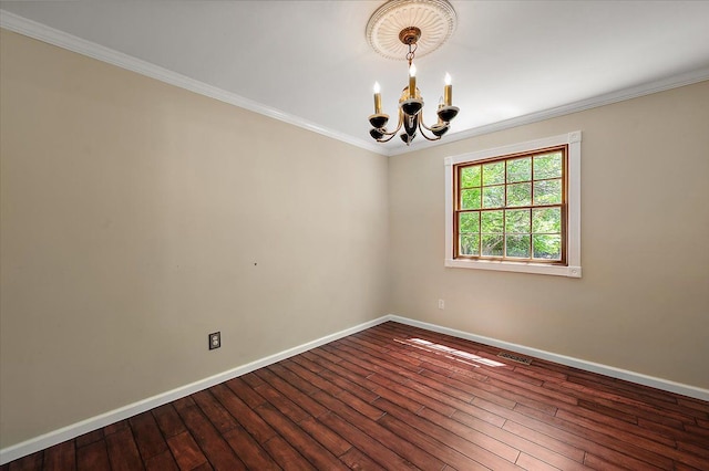 15672 Robert Dr, Macomb, MI 48044 - empty room with baseboards, a chandelier, wood-type flooring, and crown molding