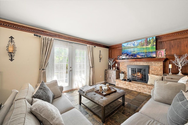 15672 Robert Dr, Macomb, MI 48044 - living room with a brick fireplace, french doors, and baseboards
