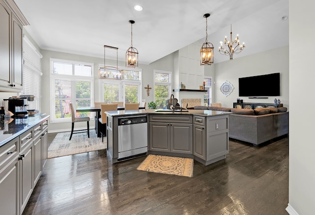 kitchen featuring dishwasher, a sink, gray cabinets, a chandelier, and high vaulted ceiling