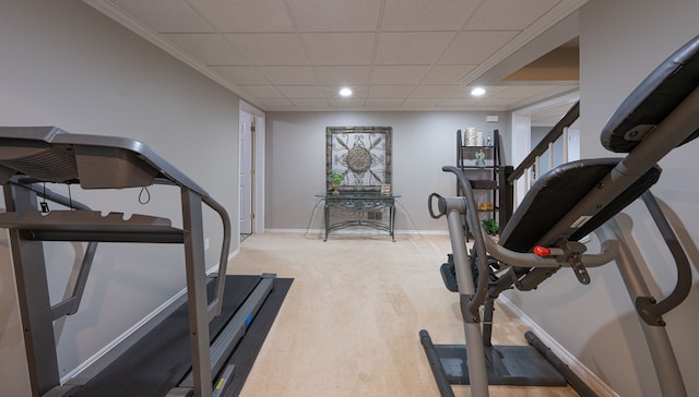 workout area featuring a paneled ceiling, carpet, baseboards, and recessed lighting