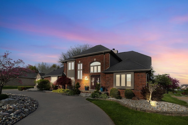 47352 Dove Ct, Shelby Twp, MI 48315 - view of front of property featuring a chimney and brick siding