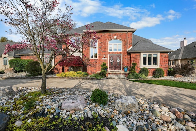 47352 Dove Ct, Shelby Twp, MI 48315 - view of front of house featuring brick siding and a shingled roof