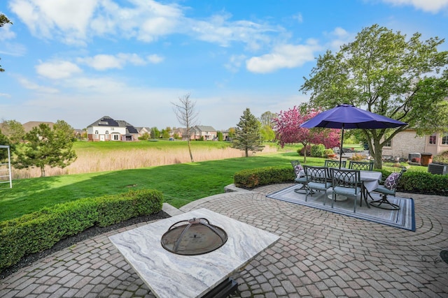 47352 Dove Ct, Shelby Twp, MI 48315 - view of patio featuring a fire pit, a residential view, central AC, and outdoor dining space