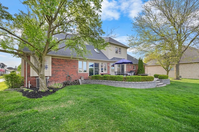 47352 Dove Ct, Shelby Twp, MI 48315 - rear view of house with brick siding, a lawn, roof with shingles, and cooling unit