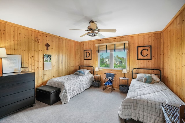 47352 Dove Ct, Shelby Twp, MI 48315 - bedroom with carpet floors, wooden walls, and a ceiling fan