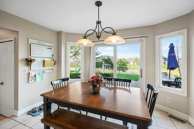 47352 Dove Ct, Shelby Twp, MI 48315 - dining space featuring light tile patterned floors and baseboards