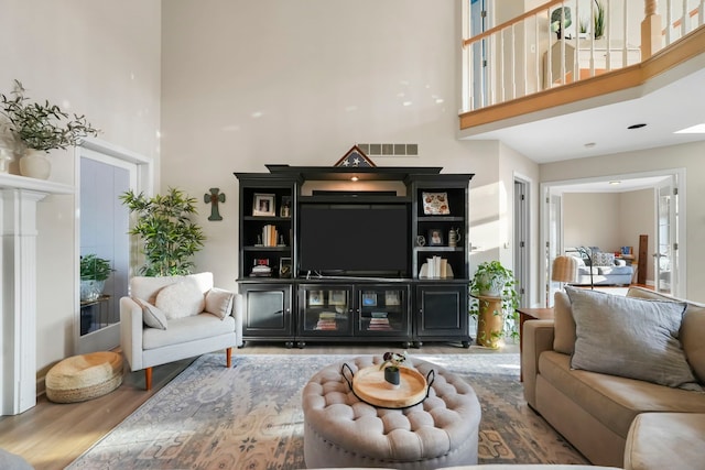 47352 Dove Ct, Shelby Twp, MI 48315 - living room with a high ceiling and wood finished floors