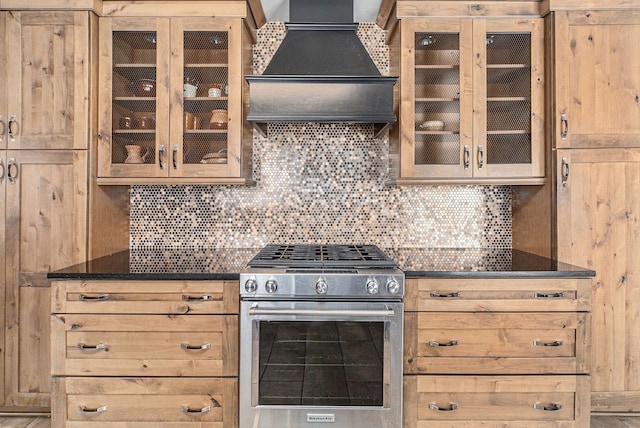4819 Thorntree Dr, West Bloomfield, MI 48322 - kitchen featuring high end range, custom exhaust hood, tasteful backsplash, and glass insert cabinets
