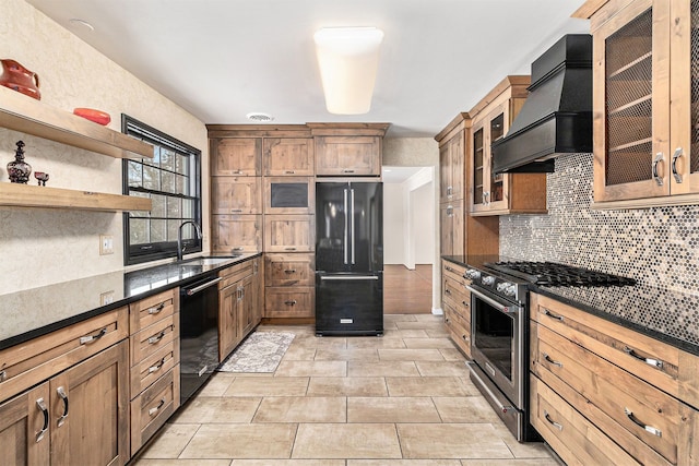 4819 Thorntree Dr, West Bloomfield, MI 48322 - kitchen with black appliances, custom range hood, a sink, decorative backsplash, and glass insert cabinets