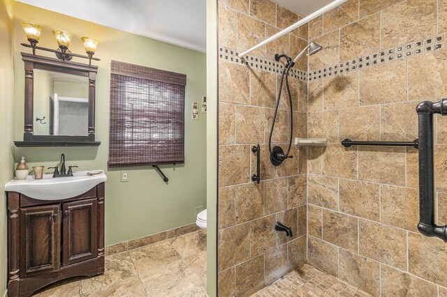 4819 Thorntree Dr, West Bloomfield, MI 48322 - full bathroom with a stall shower, vanity, baseboards, and toilet