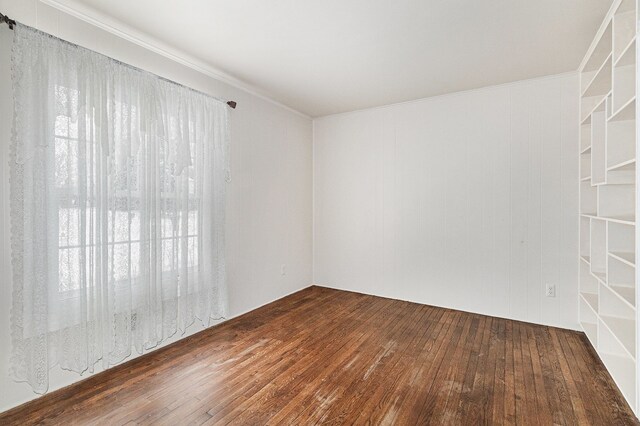 4819 Thorntree Dr, West Bloomfield, MI 48322 - empty room featuring wood-type flooring and crown molding