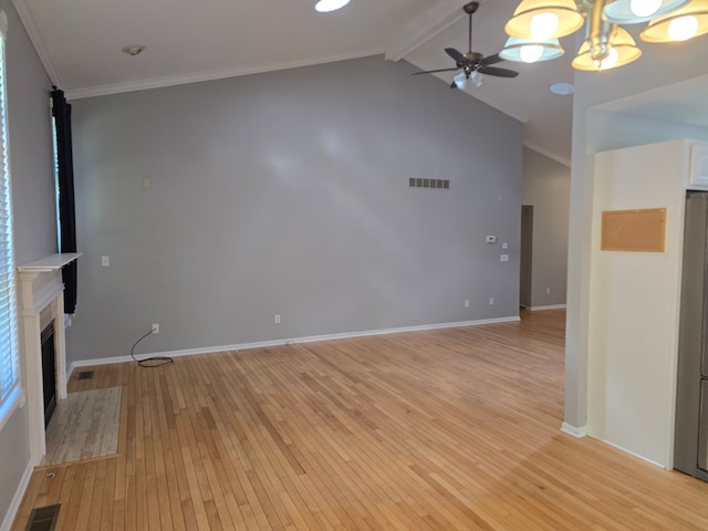 unfurnished living room with light wood-style flooring, a ceiling fan, a fireplace, a chandelier, and crown molding