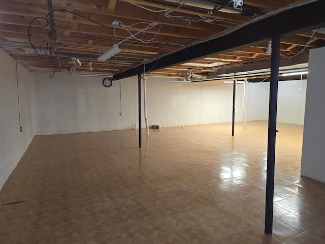 below grade area with tile patterned floors