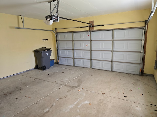 garage featuring a garage door opener
