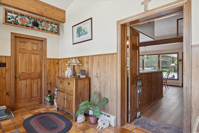 7317 Bircklan Dr, Canton, MI 48187 - foyer entrance featuring wainscoting, wooden walls, and tile patterned flooring